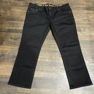 Brand new Jet Black tonal straight leg Rock Revival Jean in size 44 waist 32” L
